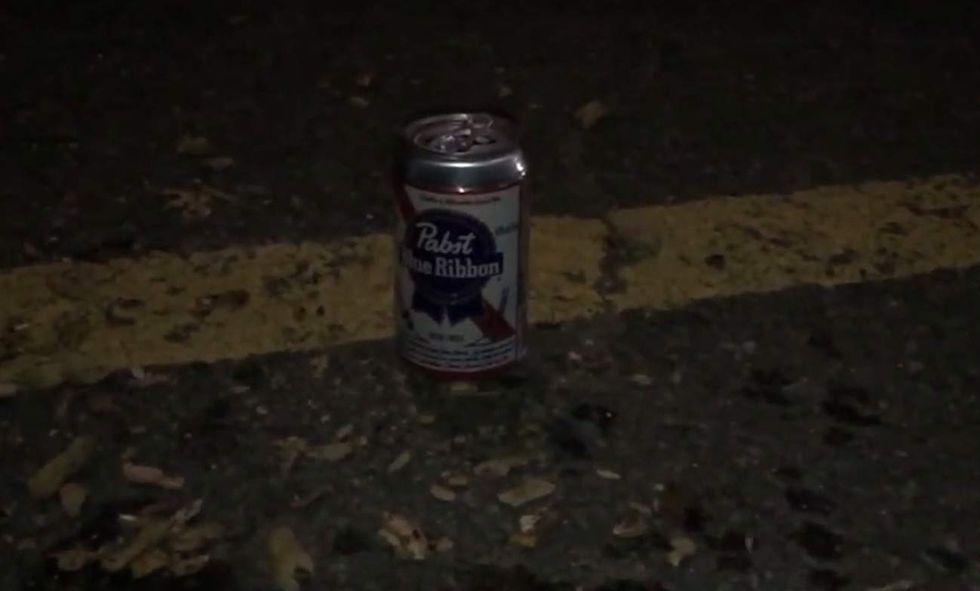 Beer can spotted near students at HS football game — and school officials' reaction is dropping jaws