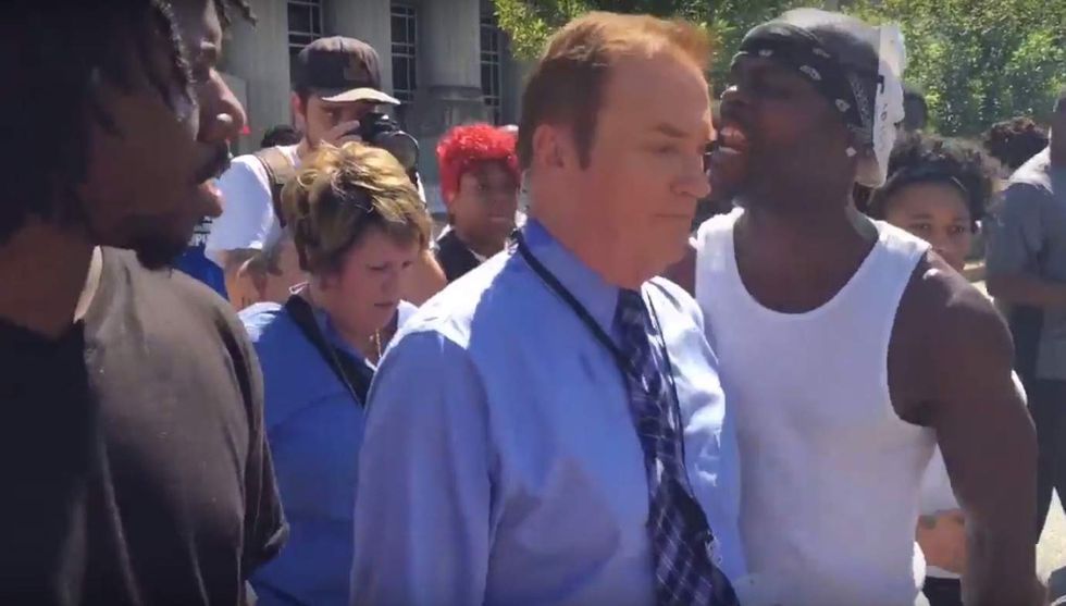 Watch what happens after St. Louis protester starts screaming in TV reporter's face: 'It was scary