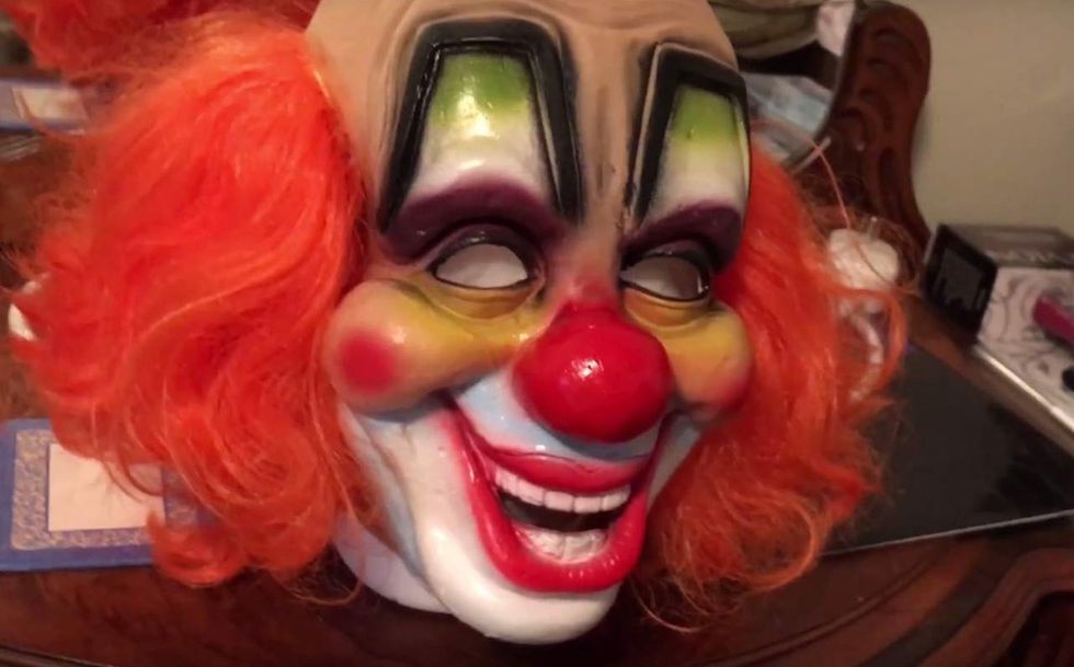 Dad allegedly in clown mask chases daughter down street to discipline her. It gets even stranger.