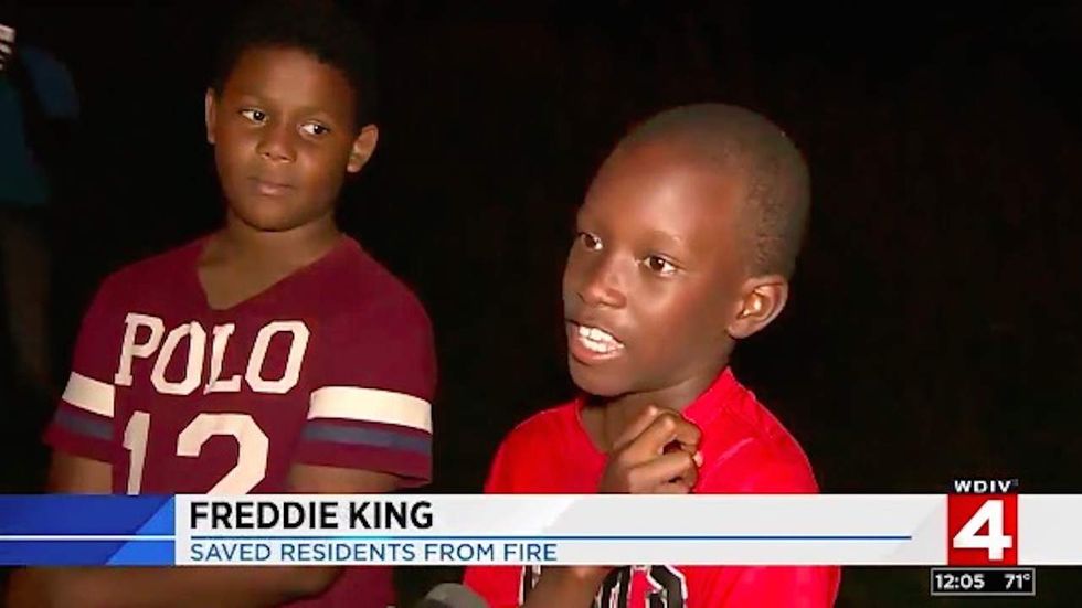 Two boys help save their neighbors from a fire in their apartment building