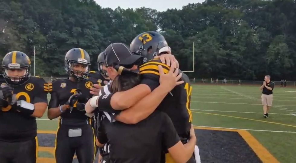 Watch: Military dad dresses up as referee to surprise his kids at a football game
