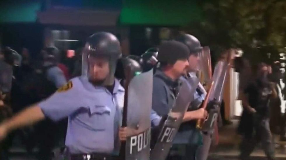 St. Louis restaurant owner gave water to protesters, ripped police. And now cops are fighting back.