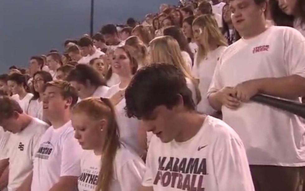Students push back after atheist complaint led to ban on loudspeaker prayer at football games
