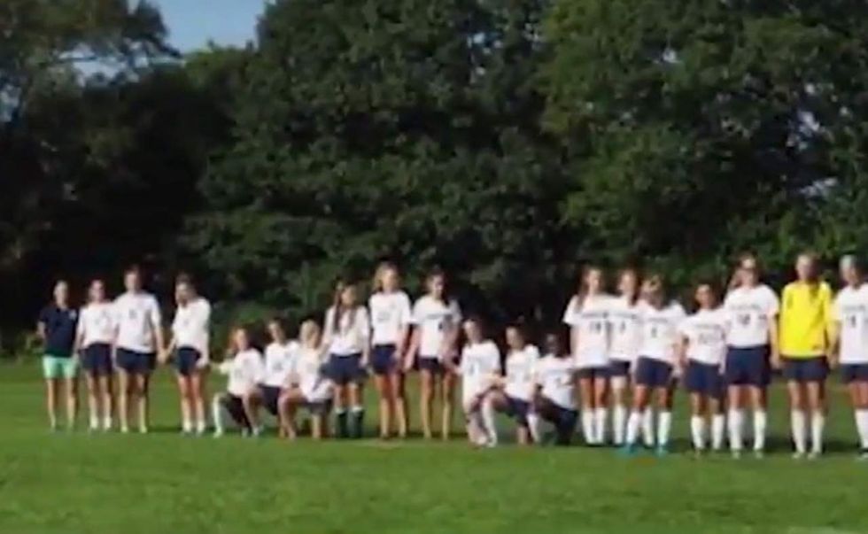 HS girls soccer players take a knee for national anthem, say they were later sent racist messages