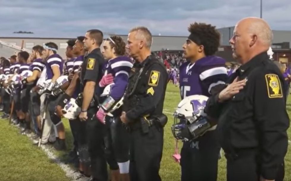 Illinois high school football players take a stand to defend the police