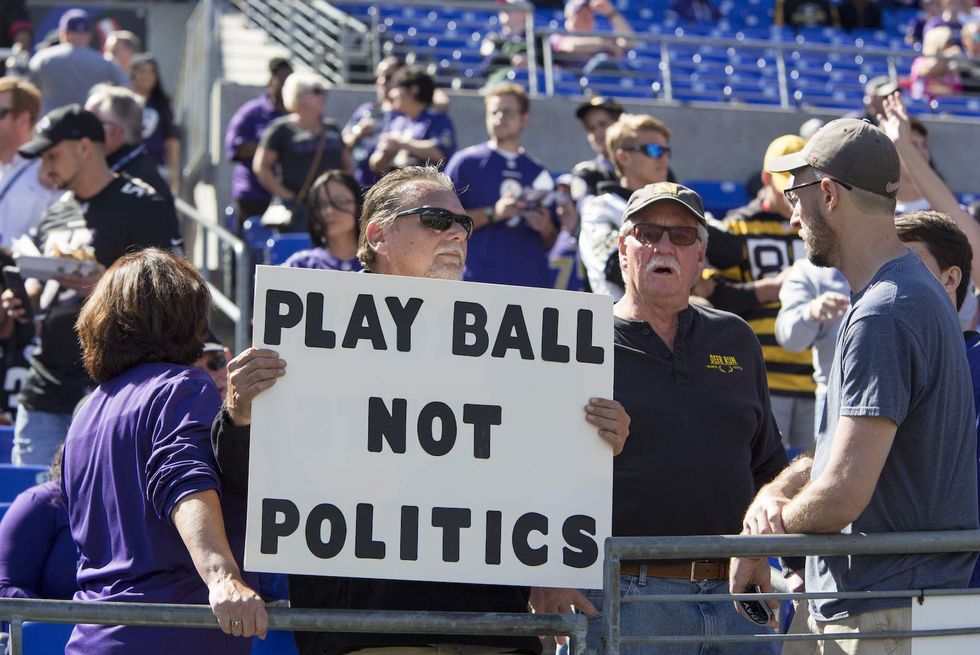 Baltimore Ravens make statement by kneeling before anthem — then fans make even louder statement