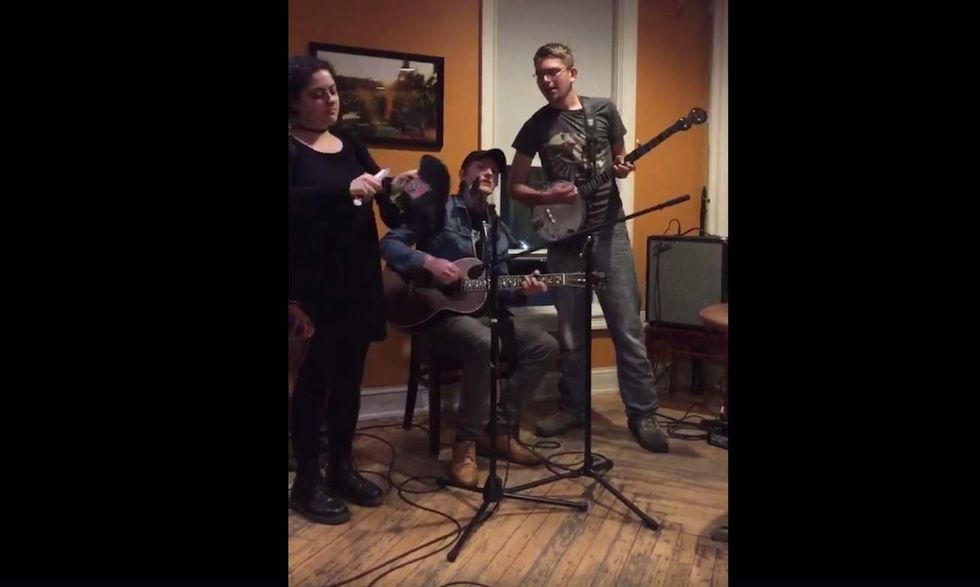 Watch: Coffee shop worker slices up singer's Confederate flag cap right in front of him (UPDATED)