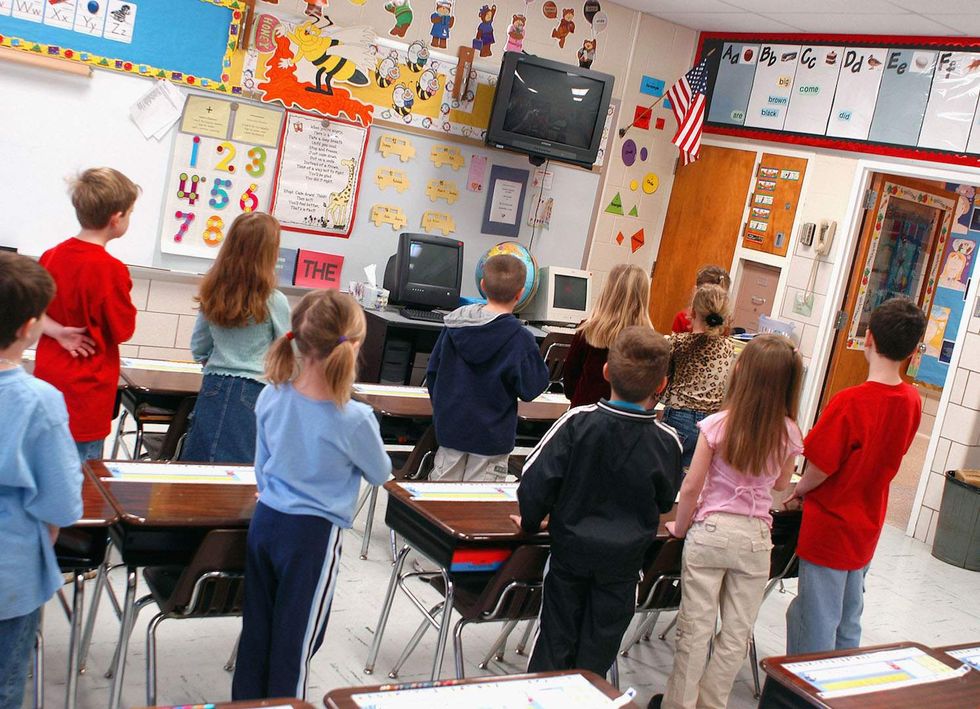 Parents sue school after principal expels student for sitting during Pledge of Allegiance