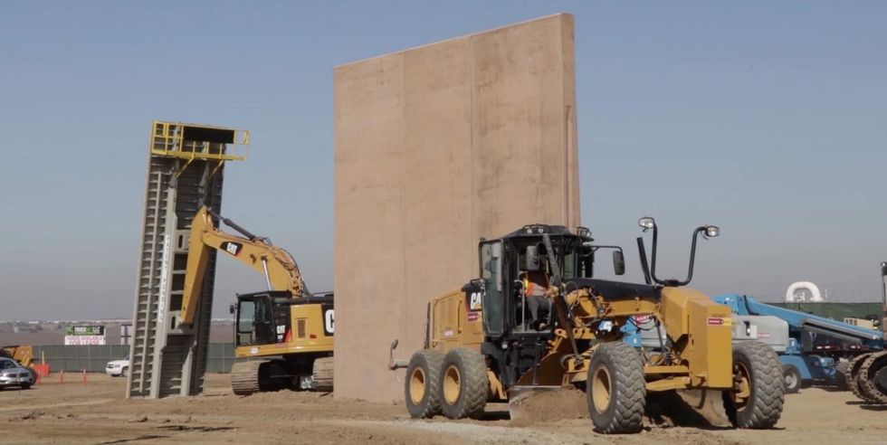 Prototypes for Trump's border wall are finally being built - here's what they look like