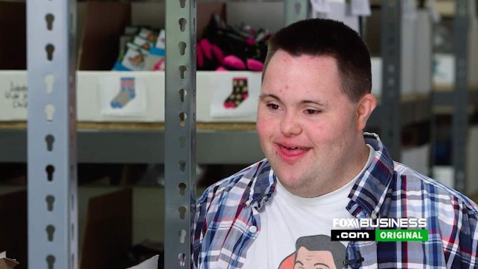Entrepreneur with Down syndrome builds $1.3 million business selling socks