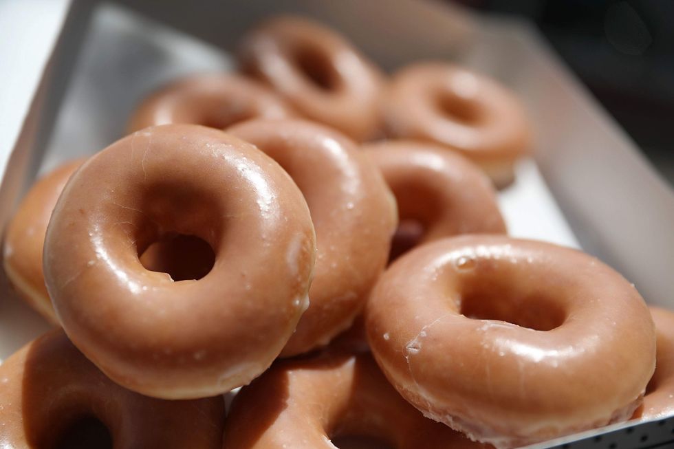 Suspect surrenders with donuts after Michigan cops accept his Facebook challenge