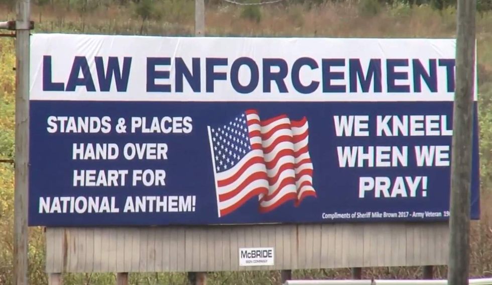 Sheriff's highway billboard pushes back against NFL anthem protests — and locals absolutely love it