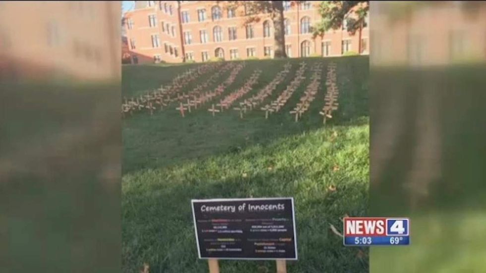 Pro-life group at a Catholic university says someone stole crosses from their display