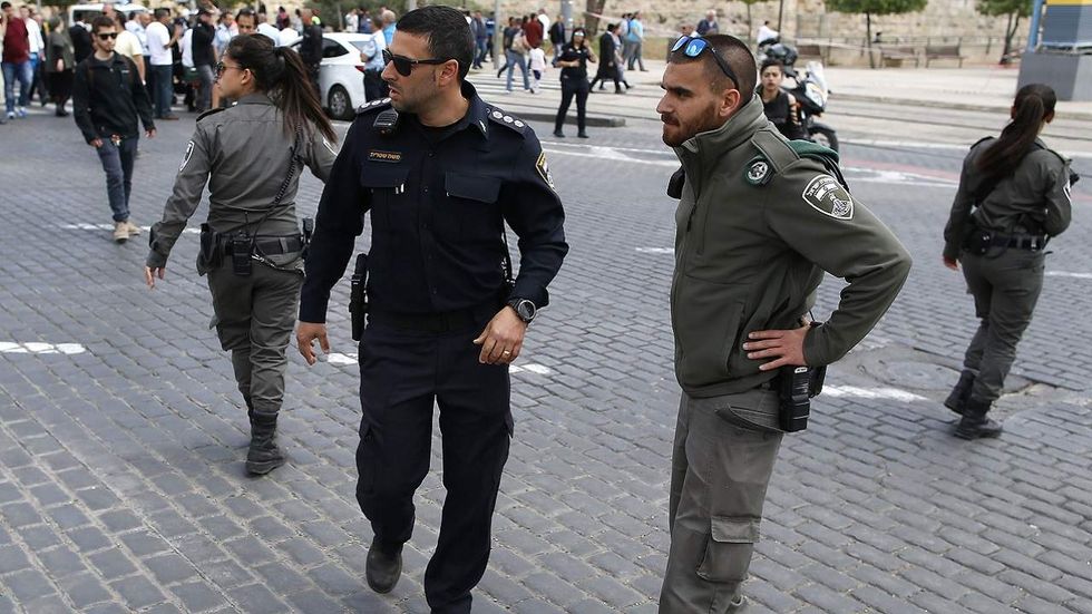 The latest from Israel: Palestinian is shot while rushing soldiers with a knife