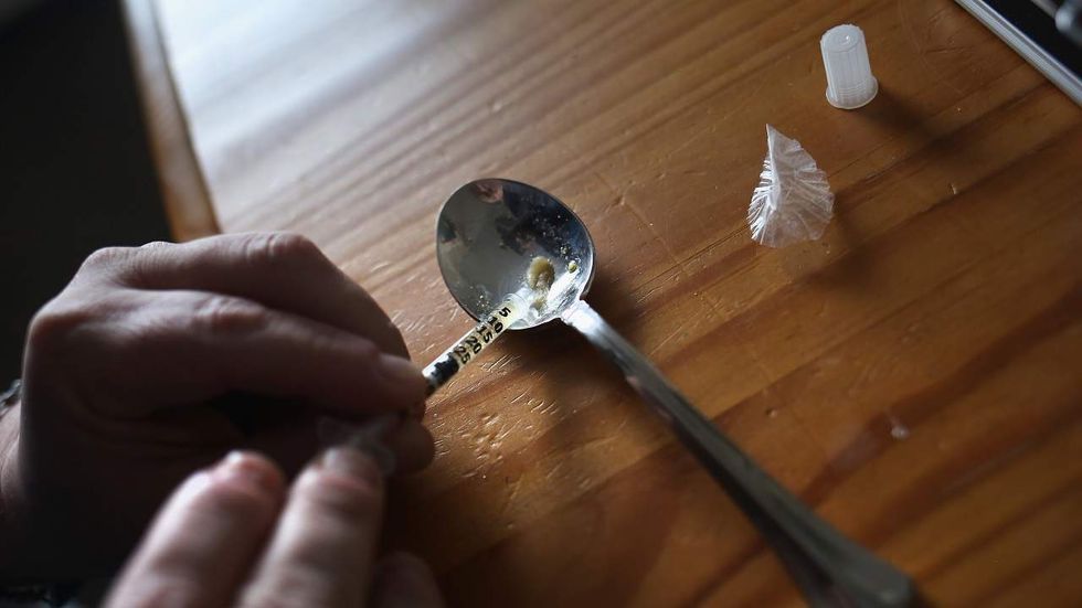 Man arrested hours after his daughter’s birth for allegedly selling heroin from her hospital room
