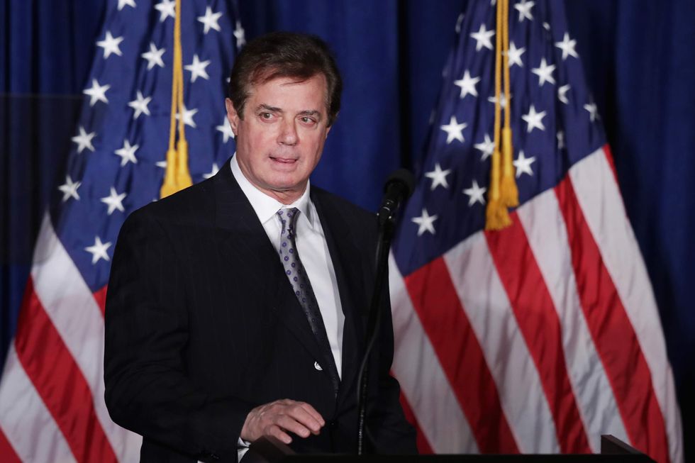 Paul Manafort, former Trump campaign manager, surrenders to FBI after being charged with 12 crimes