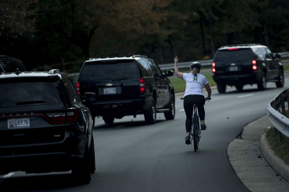 Woman who went viral for flipping off Trump’s motorcade loses job: 'How is that fair?\