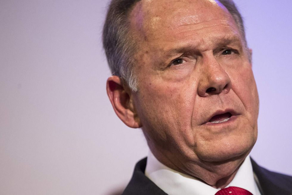 Here's what Donald Trump wants to happen in the Roy Moore situation