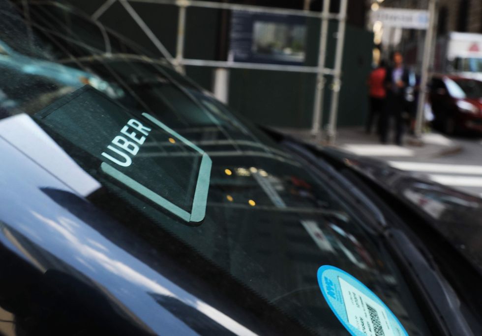 A man posing as an Uber driver sexually assaulted a woman on a university campus