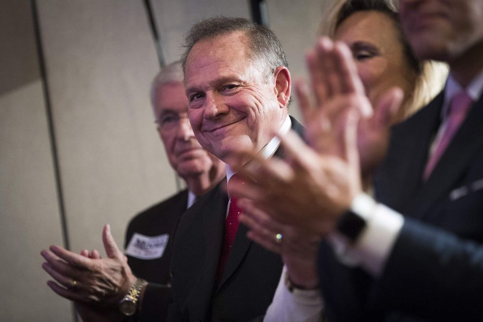 Ex-Alabama police officer says she was told to keep Roy Moore away from high school cheerleaders