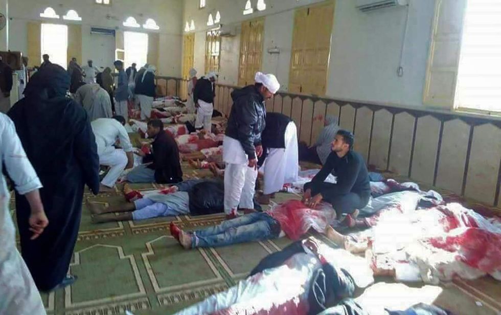 At least 100 civilians - possibly hundreds - killed in attack at Egypt mosque