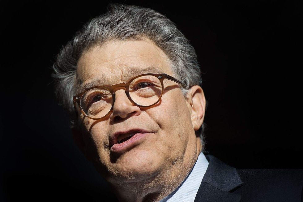LA street artist hijacks billboard, plasters photo of Al Franken grabbing at a Hollywood actress
