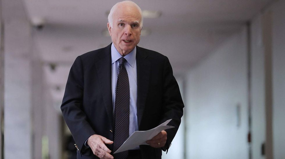 John McCain says he's voting in favor of the 'far from perfect' tax reform bill