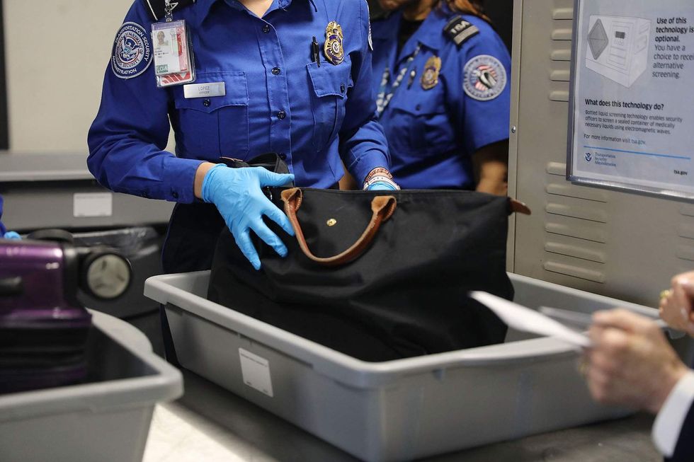 Oops! Boston airport security finds gun TSA worker 'mistakenly' packed in lunch bag