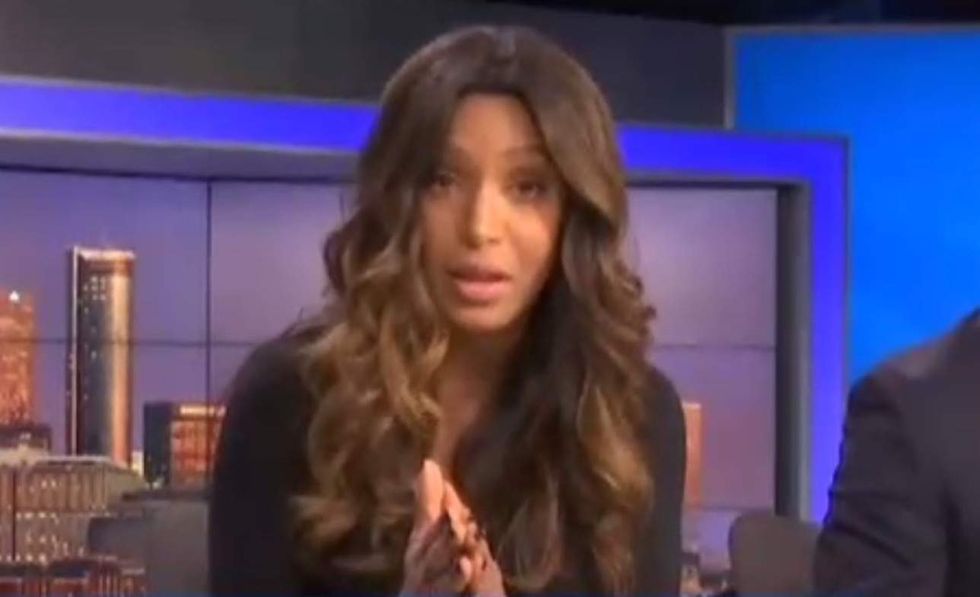 Black news anchor — on live TV — calmly scorches viewer who called her the N-word