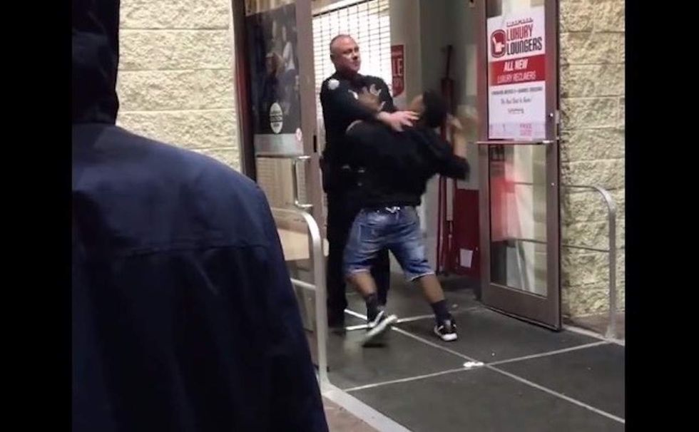 He gets in face of security guard at shopping mall. Guard shoves him — then all hell breaks loose.