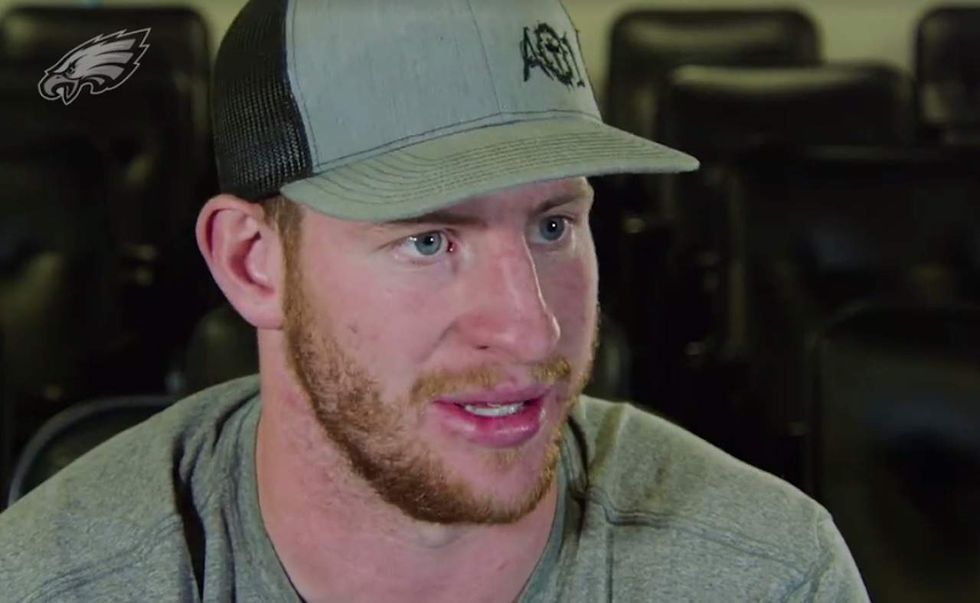 I know my God is a powerful one': QB Carson Wentz encourages fans with his faith after knee injury