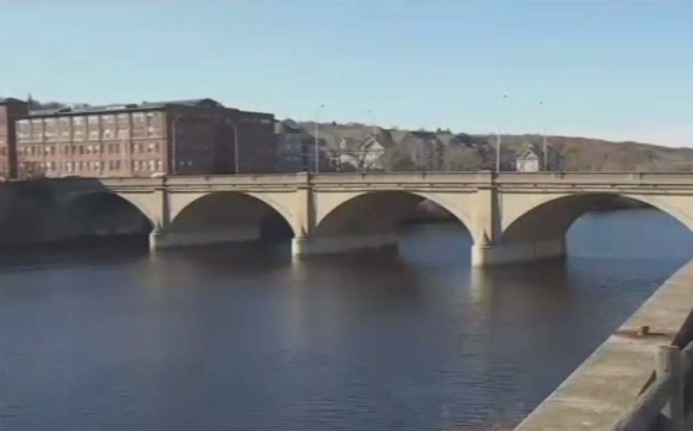 He intervenes in couple's fight—and gets tossed off four-story bridge into icy river for his trouble