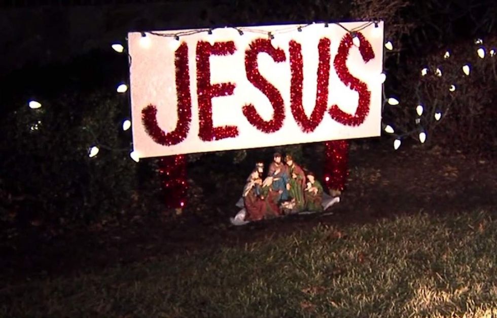 Offensive' Jesus sign in front of home sparks complaint, order to remove. But couple isn't budging.