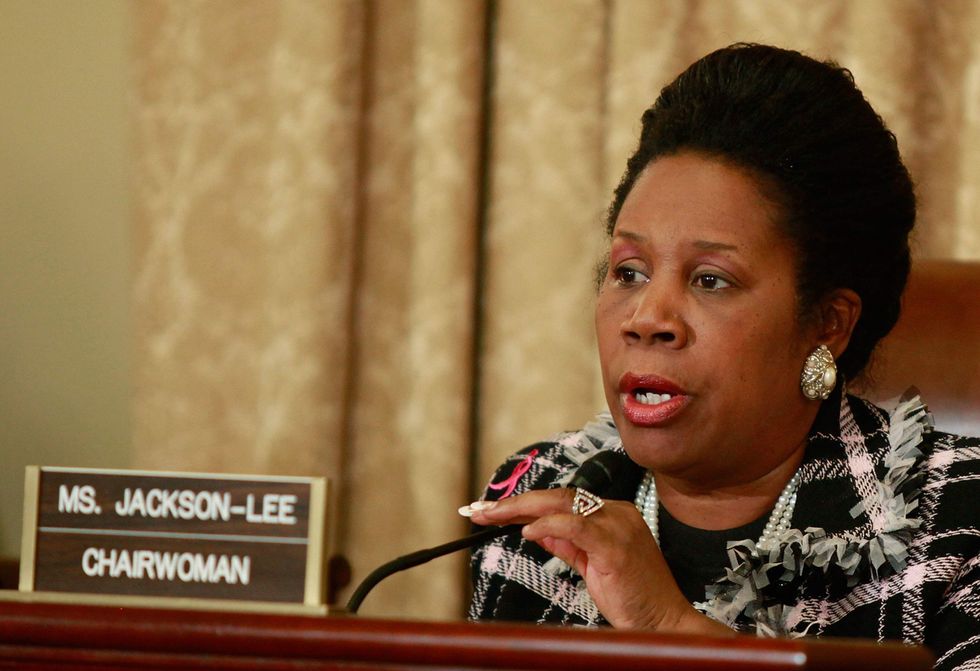 Democratic rep says she was targeted on flight by a passenger because she's black