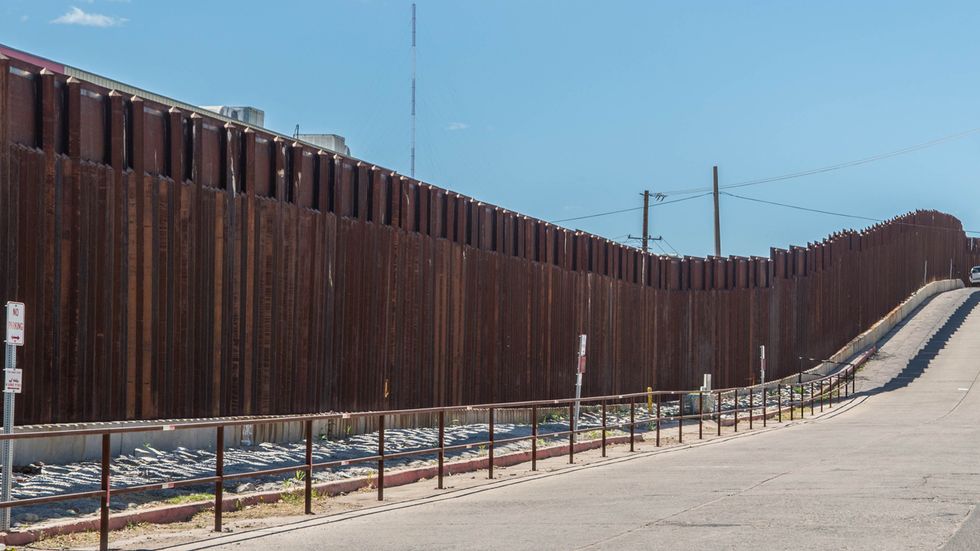 Trump administration proposes $18 billion wall bordering Mexico