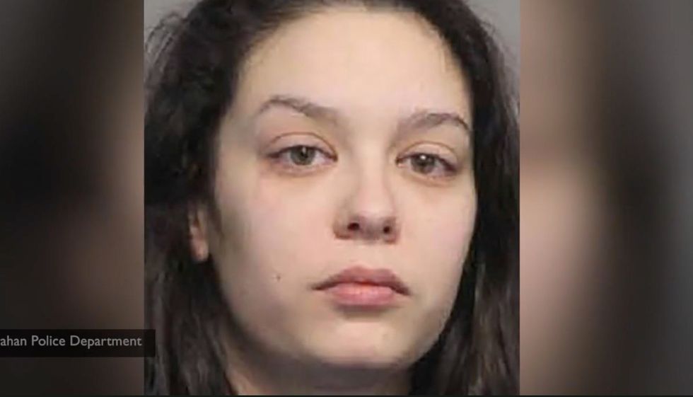 Police: Topless woman kissed and bit Uber driver's tongue while her boyfriend attempted to rob him