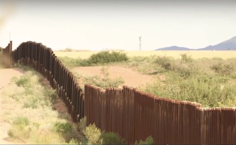 Posters blasting border wall, calling police 'predators' displayed in elementary school's classrooms