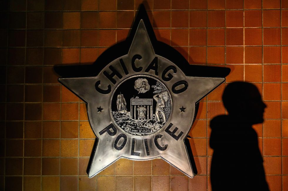 Federal authorities arrest six Chicago police officers for allegedly stealing drugs, money