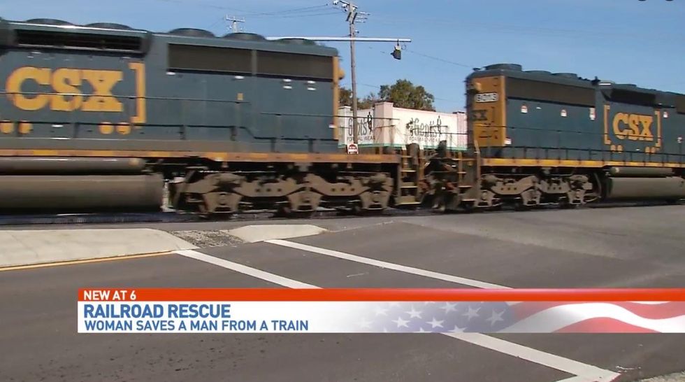 Woman's quick actions saves man from being hit by oncoming train