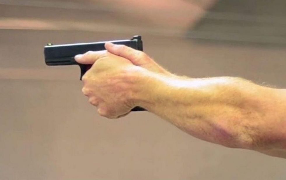 Armed man confronts crook breaking into car in his driveway. Crook charges at him — a fatal error.