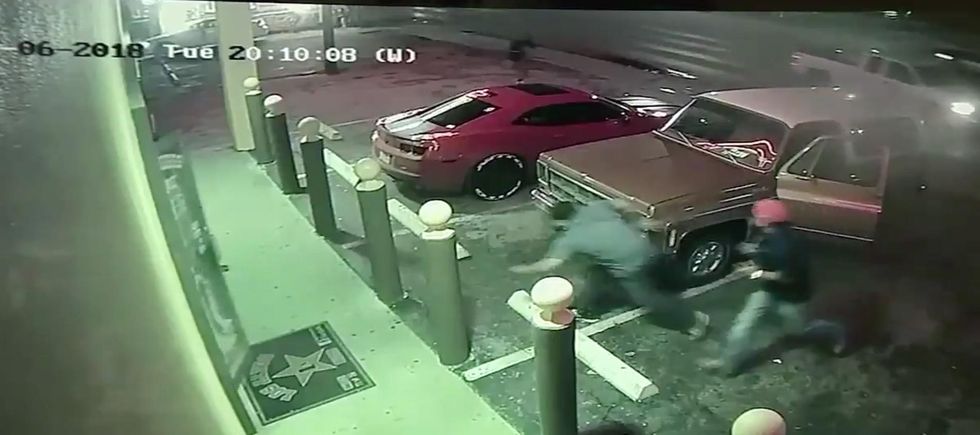 Thugs attack a father and his family in armed carjacking - but dad was armed too