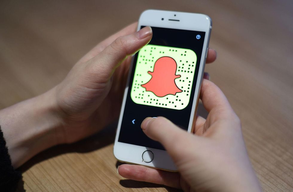 High school student arrested after allegedly posing with an AK-47 on social media