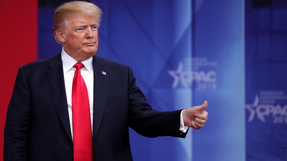 Political commentator jeered by CPAC audience for raising Trump sexual harassment allegations