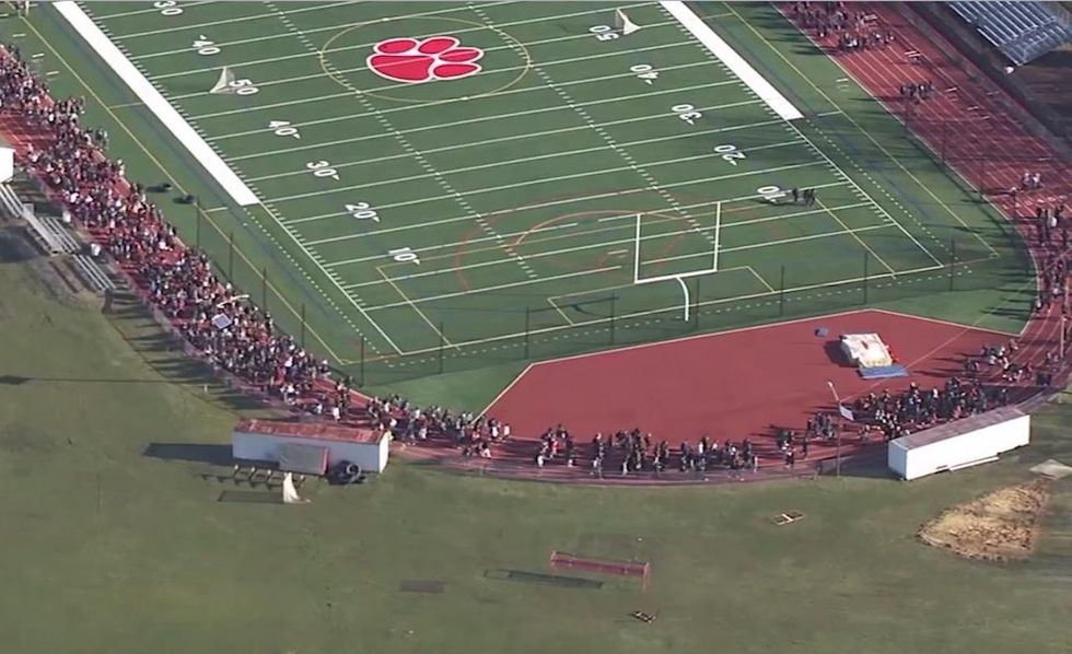 Hundreds of HS students walk out over suspension of teacher who raised school security concerns