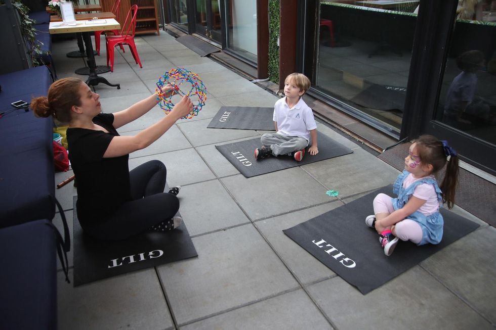 Denver elementary schools are considering replacing detention with yoga