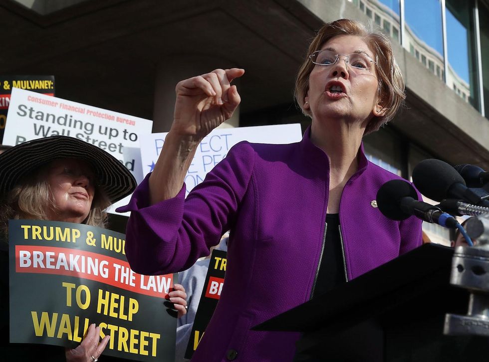 Elizabeth Warren is fundraising by attacking Democratic senators who compromise with Republicans
