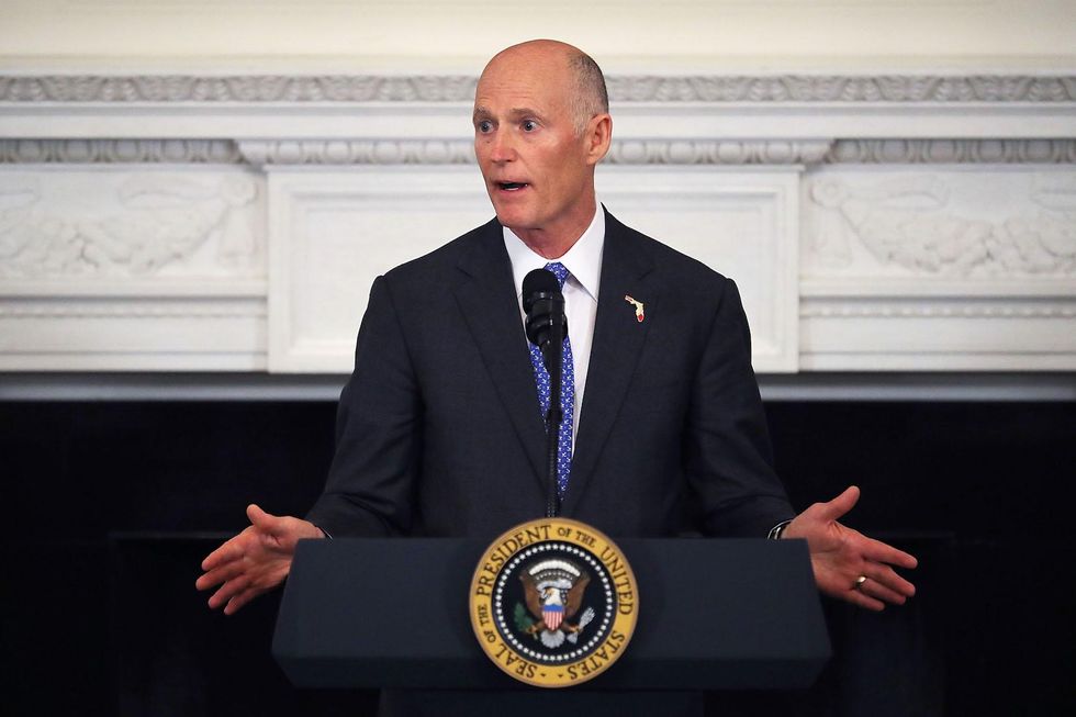 Florida Gov. Rick Scott spurns conservatives, NRA by signing new gun regulations into law