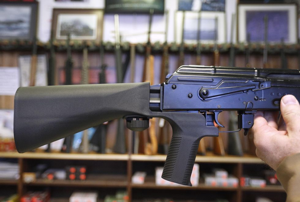 Justice Department moves to officially ban bump stocks, classifies them as 'machine guns