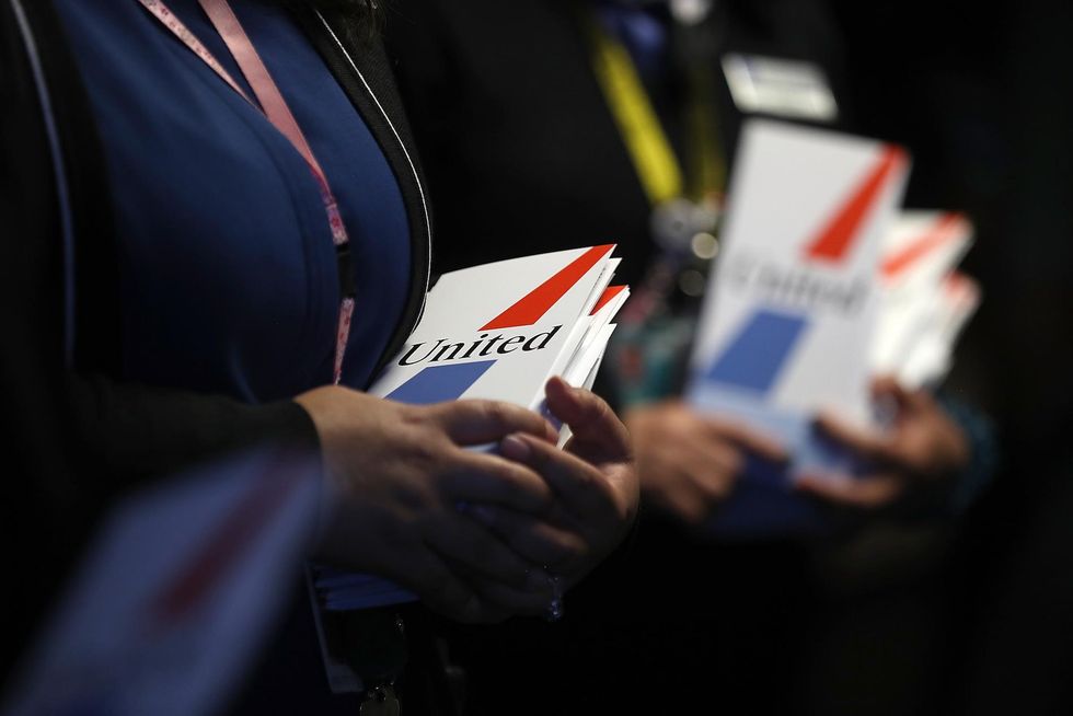United faces tough questions after what flight attendants did to a family's pet dog