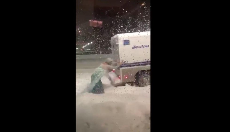 Watch: Drag Elsa single-handedly pushes stuck police wagon free on a frozen night in Boston